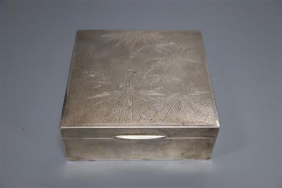 A Chinese Export white metal mounted cigarette box, by Wai Kee, Hong Kong, engraved with bamboo, 10.7cm, gross 12.5oz.